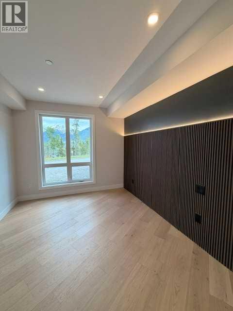 103, 101h Stewart Creek Rise, Canmore, Alberta  T1W 0K2 - Photo 20 - A2318180