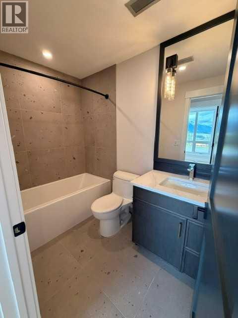 103, 101h Stewart Creek Rise, Canmore, Alberta  T1W 0K2 - Photo 31 - A2318180