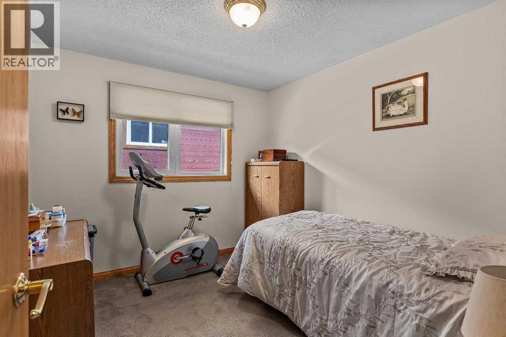 117 Kodiak Road, Canmore, Alberta  T1W 1C5 - Photo 21 - A2324057