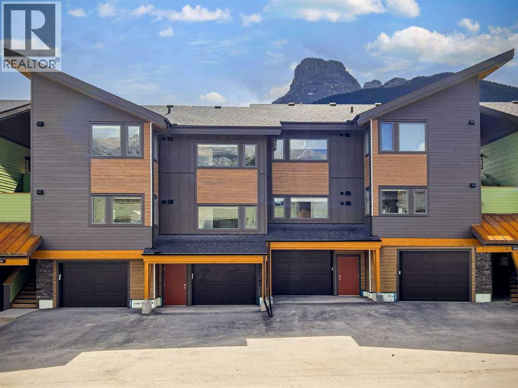 202g, 209 Stewart Creek Rise, Canmore, Alberta  T1W 0N9 - Photo 1 - A2332268